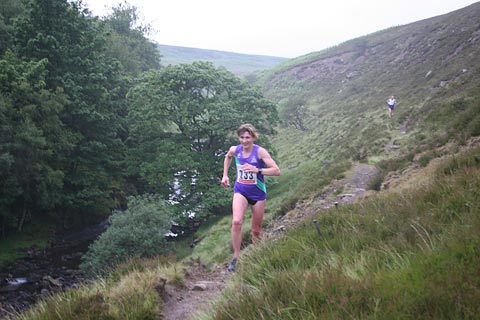 Karen Robertson striding out in the Saltwell Harriers Fell Race